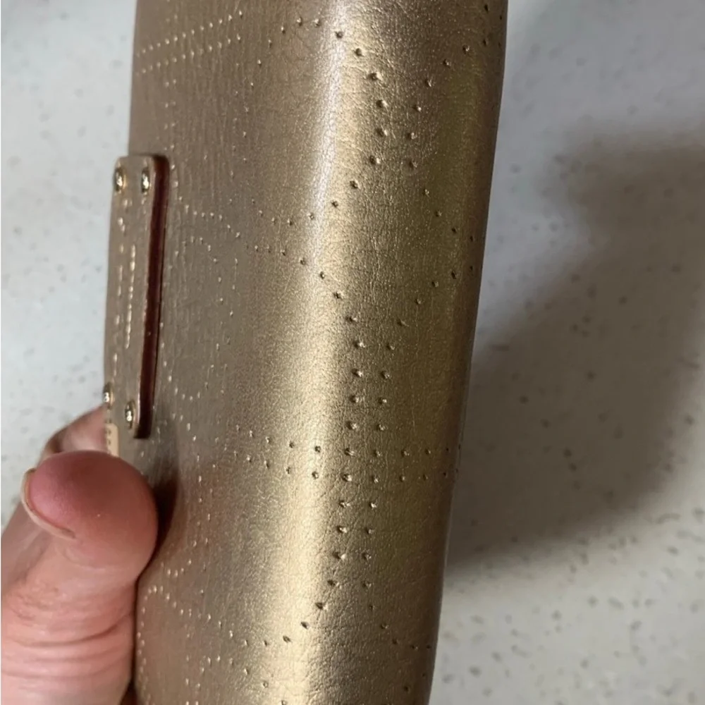 Kate Spade Metro Spade Neda Continental Zip Wallet in Gold